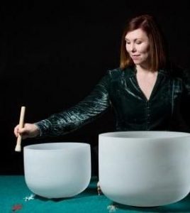 Mary Kate McGetrick plays quartz singing bowls.